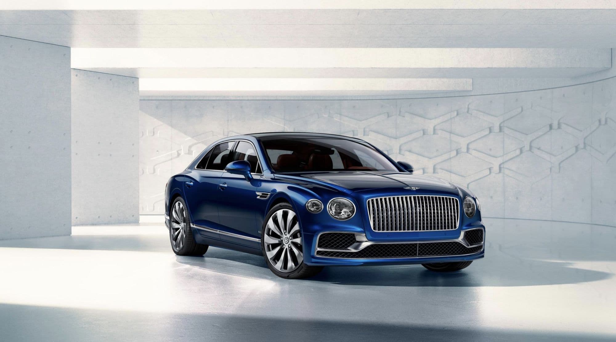 Bentley Flying Spur render, front three-quarter view in a white studio